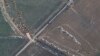 This satellite image provided by Maxar Technologies shows fortifications and dragons in Medvedivka, Crimea, Feb. 11, 2023.