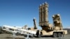 In this image released by the Iranian Defense Ministry on Feb. 17, 2024, the domestically built Arman air defense system, right, is displayed during its unveiling with Sayyad-3 missiles, left, at an undisclosed location in Iran.