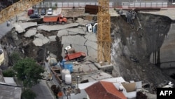 FILE — The collapsed portion of the construction site of the Pinheiros subway station in Sao Paulo, Brazil, Jan. 12, 2007. Executives and firms involved in the project have been fined $48 million, according to a ruling the AFP viewed Feb. 17, 2024. Seven died in the collapse.