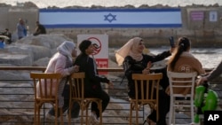 Palestinezët gjatë festës së Bajramit në Tel Aviv, Izrael