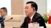 FILE - Vietnamese Chairman of the National Assembly Vuong Dinh Hue speaks to Chinese President Xi Jinping during a meeting at the national assembly in Hanoi, Vietnam, Dec. 13, 2023.