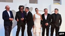 FILE- (From L) Producer Jaume Roures, director Mariano Cohn, actors Antonio Banderas, Penelope Cruz, Oscar Martinez and director Gaston Duprat, Sept. 4, 2021 at 78th Venice Film Festival.