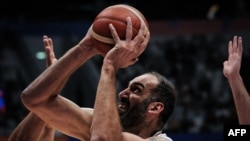 Iran's Hamed Haddadi shoots during the FIBA Basketball World Cup group P match between Iran and Lebanon at Indonesia Arena in Jakarta, Sept. 2, 2023.