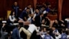 FILE - Anggota parlemen Taiwan berdebat dan saling pukul saat sidang parlemen di Taipei, Taiwan 17 Mei 2024. (REUTERS/Ann Wang)