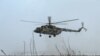 FILE — A Russian Mi-8 military helicopter being tested by the Russian Air Force of the Southern Military District in the Rostov region, Russia, Jan. 19, 2022. Ukraine's GUR military intelligence say it lured a Russian military pilot to land his Mi-8 at a Ukrainian airfield.
