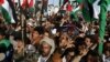People protest in support of Palestinians in Gaza as the conflict between Israel and Hamas continues, in Sanaa, Yemen, Oct. 18, 2023.