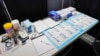 COVID tests are set up inside the medical intake tent at a shelter in New York on Aug. 15, 2023. Health authorities are monitoring a new variant of COVID, the World Health Organization announced on Aug. 18, 2023.