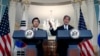 South Korean Foreign Minister Yun Byung-se listens as Secretary of State John Kerry speaks to the media, Oct. 19, 2016, at the State Department in Washington.