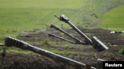FILE - Armenian artillery is seen near Nagorno-Karabakh's boundary, April 8, 2016.