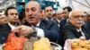 Turkey's Minister for Culture and Tourism Nabi Avci and Turkish Foreign Minister Mevlut Cavusoglu attend the International Tourism Trade Fair in Berlin, Germany, March 8, 2017. 