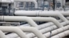 FILE - Pipes are pictured at a gas compressor station in Mallnow, Germany, Nov. 1, 2021.