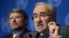 FILE - World Meteorological Organization (WMO) Secretary-General Michel Jarraud (r).