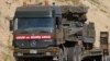 A Turkish military truck transports a mobile missile launcher to the Syrian border, near Kilis, Turkey, June 28, 2012. (AP).