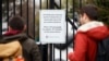 A closed sign is posted on the gate of Smithsonian's National Zoo, Wednesday, Jan. 2, 2019, in Washington. Smithsonian's National Zoo is closed due to the partial government shutdown. 