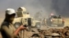 Members of Iraqi army are seen during the war between Iraqi army and Shi'ite Popular Mobilization Forces (PMF) against the Islamic State militants in al-Ayadiya, northwest of Tal Afar, Iraq, Aug. 28, 2017.