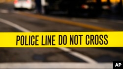 Police tape at the scene of a 2021 shooting.