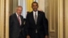 President Barack Obama and Senate Majority Leader Harry Reid arrive for a meeting with Senate Democrats on Capitol Hill, July 31, 2013. 