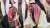 In this photo provided by Saudi Press Agency, newly enthroned King Salman, right, talks with Kuwait's emir, Sheikh Sabah Al-Ahmad Al-Jaber Al-Sabah, during King Abdullah's funeral in Riyadh, Jan. 23, 2015.