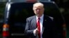 President Donald Trump gives a thumbs-up as he walks to board Marine One on the South Lawn of the White House in Washington, April 18, 2017.