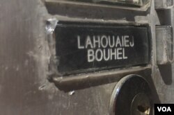 Outside the former home of Mohamed Lahouaiej Bouhlel, 31, who plowed a truck into a crowd in Nice, some neighbors are quick to denounce him — and quick to end the conversation, fearing police attention. (H. Murdock/VOA)
