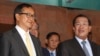 FILE PHOTO - Cambodian Prime Minister Hun Sen, right, talks with the main Opposition Party leader Sam Rainsy, left, of Cambodia National Rescue Party, after their meeting in Senate headquarters in Phnom Penh, Cambodia, Tuesday, July 22, 2012.