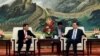 Philippines President Rodrigo Duterte (L) and Zhang Dejiang, Chairman of the Standing Committee of the National People's Congress of China, hold a meeting at the Great Hall of the People in Beijing, Oct. 20 2016. 