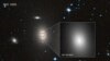 Image of the massive galaxy NGC 1600, and the bright center of the galaxy where the 17-billion-solar-mass black hole resides. (ESA/Hubble image courtesy of STScI) 