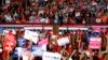 Supporters waves signs as President Donald Trump speaks at a rally, Nov. 3, 2018, in Pensacola, Florida.