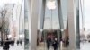 Customers leave the Apple store in Brooklyn, N.Y., Jan. 3, 2019. Apple's warning that its Chinese sales were weakening ratcheted up concerns about the world's second-largest economy and weighed heavily on global markets Thursday.