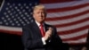 FILE - Donald Trump, at the time still President-elect, arrives to speak during a "Thank you" tour event at Giant Center in Hershey, Pennsylvania, Dec. 15, 2016.