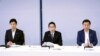 8月22日上午，日本首相岸田文雄（中）在围绕福岛一核处理水排海的相关阁僚会议上发言。