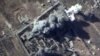 A video grab made on October 12, 2015, shows an image taken from footage made available on the Russian Defense Ministry's website, purporting to show explosions after airstrikes carried out by Russian jets on what Moscow says was an Islamic State target.