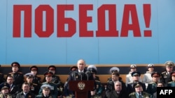 Президент Росії Путін під час промови на параді до 9 травня на Красній площі. Photo by Mikhail KLIMENTYEV / POOL / AFP