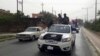 Fighters of the Islamic State of Iraq and the Levant (ISIL) celebrate on vehicles taken from Iraqi security forces, at a street in city of Mosul, June 12, 2014.