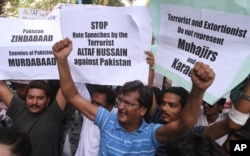 People rally against Altaf Hussain, leader of the Muttahida Qaumi Movement, or MQM, in Karachi, Pakistan, Aug. 23, 2016.