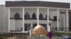 Afghanistan's new parliament building is seen after rockets hit its compound in Kabul, March 28, 2016. 