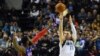 Luka Doncic de Dallas tire lors du match face à Detroit Pistons, USA, le 12 décembre 2019. (Photo by PEDRO PARDO / AFP)