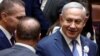 FILE - Israeli Prime Minister Benjamin Netanyahu arrives to attend the swearing-in ceremony of members of Israel's 21st Knesset, or parliament, in Jerusalem, April 30, 2019. 
