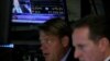 Traders work on the floor of the New York Stock Exchange (NYSE) in New York City, June 27, 2016. 