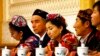 Members of the Xinjiang provincial delegation listen to representatives from the National People's Congress (NPC) during their meeting in the Xinjiang Room inside the Great Hall of the People in Beijing November 9, 2012. REUTERS/David Gray (CHINA - Tags: