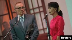 Burmese pro-democracy leader Aung San Suu Kyi after a meeting with Australian Foreign Minister Bob Carr, Yangon June 6, 2012.