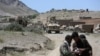 U.S. forces and Afghan commandos are seen in Asad Khil near the site of a U.S. bombing in the Achin district of Jalalabad, east of Kabul, Afghanistan, April 17, 2017. 