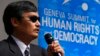 Blind Chinese dissident Chen Guangcheng addresses the sixth Geneva Summit for Human Rights and Democracy after receiving its first Courage Award, in Geneva, Feb. 25, 2014.