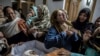 FILE - A mother mourns her son Mohammed Ali Khan, 15, a student who was killed during an attack by Taliban gunmen on the army-administered Public School, at her house in Peshawar, December 16, 2014.