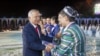 Uzbekistan's President Islam Karimov (L) greets artists during an Independence Day celebration in Tashkent August 31, 2012. Uzbekistan is marking the 21st anniversary of independence. REUTERS/Shamil Zhumatov (UZBEKISTAN - Tags: POLITICS ANNIVERSARY)