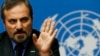 Louay Safi, spokesperson for the Syrian National Coalition, addresses a news conference at the United Nations European headquarters in Geneva, Feb. 14, 2014. 