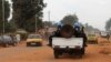 FILE - Soldiers of the U.N. force known by its French acronym MINUSCA are seen sitting on a vehicle in Bangui, Central African Republic.