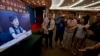 Journalists watch online pre-recorded testimony by Gu Kailai, wife of former Chinese politician Bo Xilai, in Shandong province, Aug. 23, 2013.