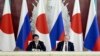 Japanese Prime Minister Shinzo Abe speaks at a news conference with Russian President Vladimir Putin in Moscow's Kremlin, April 29, 2013. 