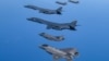 FILE - US Air Force B-1B bombers, F-16 fighter jets and South Korean Air Force F-35A take part in a joint air drill, South Korea, March 19, 2023.